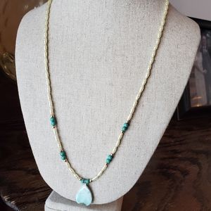23.5" pearlescent beaded turquoise necklace